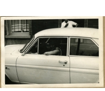 Lotje Kesteleyn in een wagen, Melle, 1960-1970